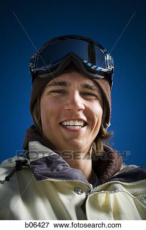 Young adult man outside in the snow View Large Photo Image Stock Photo - Young adult man outside in the snow. Fotosearch