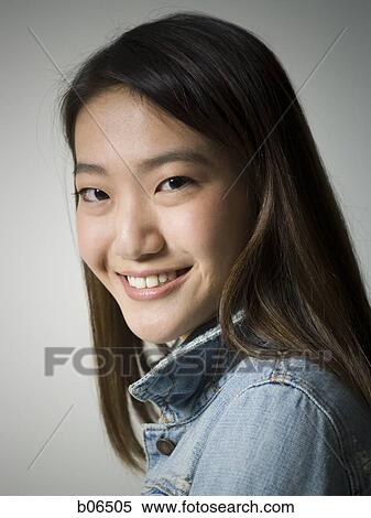 Young adult woman smiling View Large Photo Image Stock Photography - Young adult woman smiling. Fotosearch