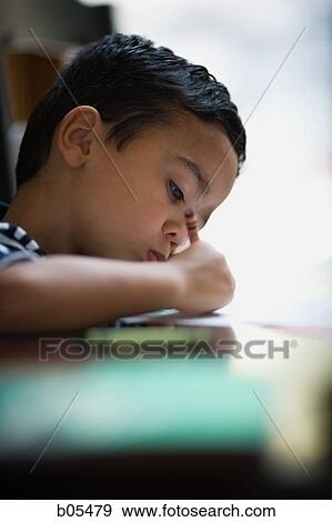 Young boy coloring View Large Photo Image Stock Photo - Young boy coloring. Fotosearch