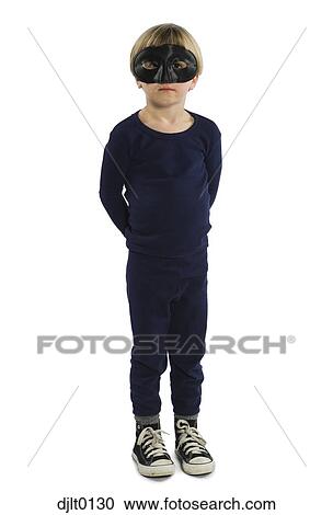 Stock Image - Young boy in black mask. Fotosearch