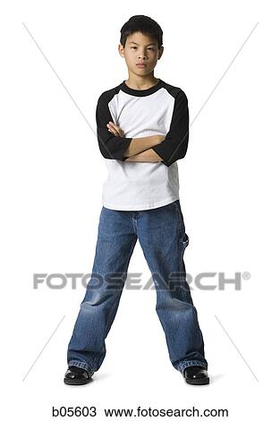 Young boy scowling View Large Photo Image Stock Image - Young boy scowling. Fotosearch
