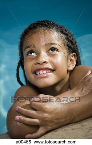 Young girl in water looking up View Large Photo Image Stock Photography - Young girl in water looking up. Fotosearch