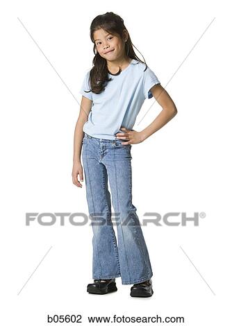 Young girl posing and smiling View Large Photo Image Stock Image - Young girl posing and smiling. Fotosearch