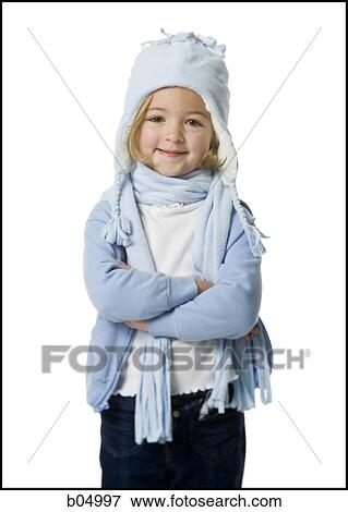Young girl with hat and scarf with arms crossed View Large Photo Image Stock Photo - Young girl with hat and scarf with arms crossed. Fotosearch