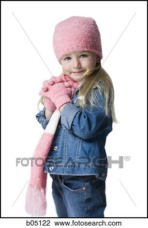 Young girl with pink hat scarf and gloves View Large Photo Image Stock Image - Young girl with pink hat scarf and gloves. Fotosearch