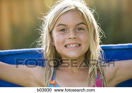 Young girl wrapped in towel View Large Photo Image Stock Image - Young girl wrapped in towel. Fotosearch