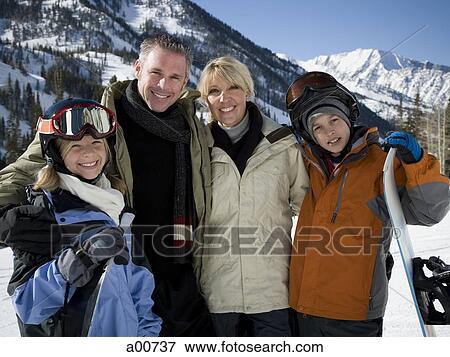 A family on a snowy mountain View Large Photo Image Stock Photo - A family on a snowy mountain. Fotosearch