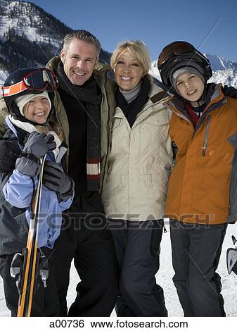 A family on a snowy mountain View Large Photo Image Stock Photograph - A family on a snowy mountain. Fotosearch