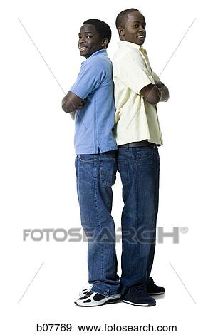 African-American brothers standing back to back View Large Photo Image Stock Photo - African-American brothers standing back to back. Fotosearch