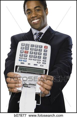 African-American businessman checking his wristwatch View Large Photo Image Stock Photo - African-American businessman checking his wristwatch. Fotosearch