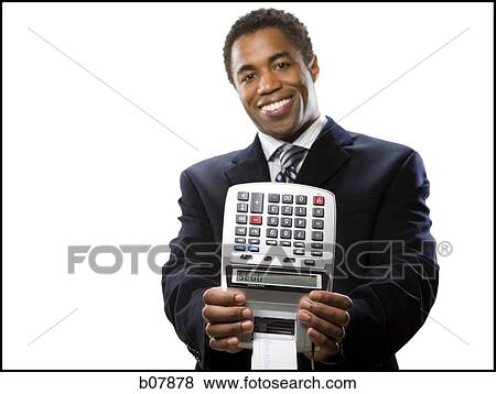African-American businessman checking his wristwatch View Large Photo Image Stock Photo - African-American businessman checking his wristwatch. Fotosearch