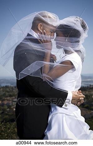 Picture - African-American newlywed couple. Fotosearch