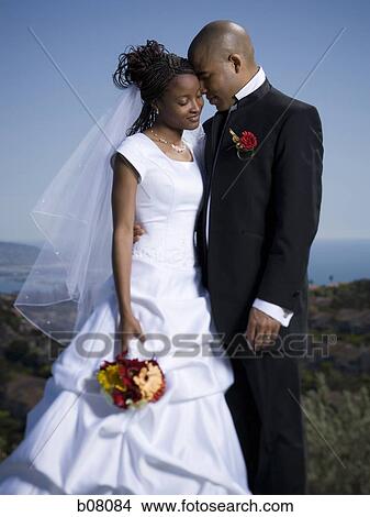 Picture - African-American newlywed couple. Fotosearch