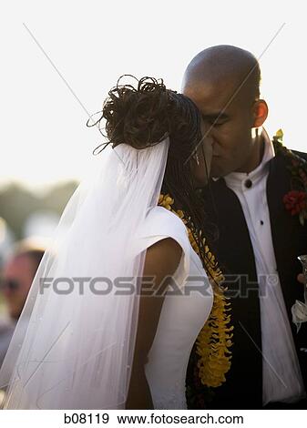 Stock Photo - African-American newlywed couple. Fotosearch
