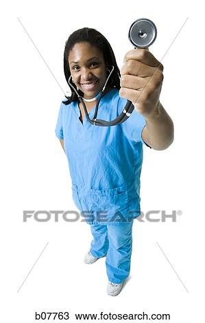 African-American nurse holding stethoscope View Large Photo Image Stock Image - African-American nurse holding stethoscope. Fotosearch