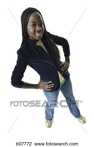 African-American woman posing with hands on hips View Large Photo Image Stock Image - African-American woman posing with hands on hips. Fotosearch