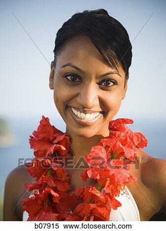 African-American woman with a red lei View Large Photo Image Stock Photography - African-American woman with a red lei. Fotosearch