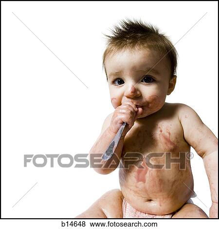 Baby covered with baby food View Large Photo Image Stock Photo - Baby covered with baby food. Fotosearch