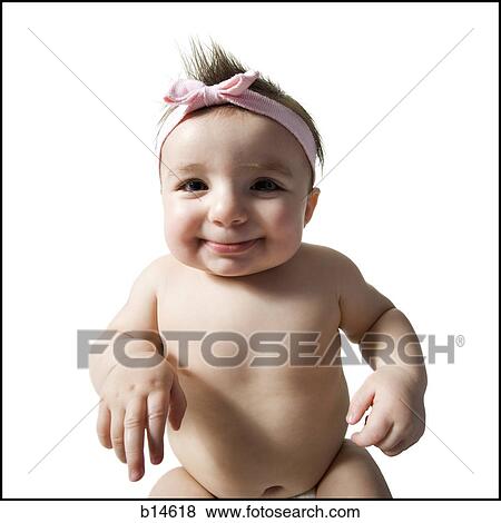 Stock Photo - Baby girl sitting in diaper. Fotosearch