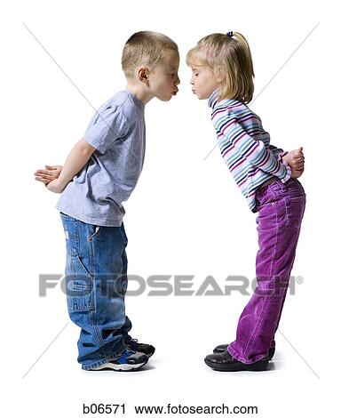 Boy and girl about to kiss View Large Photo Image Stock Image - Boy and girl about to kiss. Fotosearch