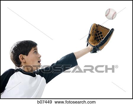 Boy catching a baseball in glove View Large Photo Image Stock Photo - Boy catching a baseball in glove. Fotosearch