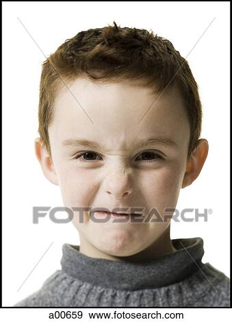 Boy looking unhappy View Large Photo Image Stock Photo - Boy looking unhappy. Fotosearch