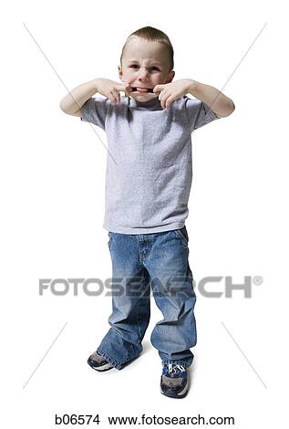 Boy making funny face View Large Photo Image Picture - Boy making funny face. Fotosearch