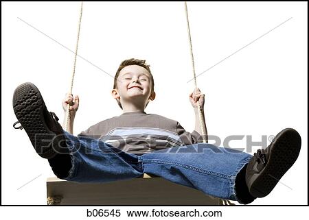 Boy on swing View Large Photo Image Stock Photography - Boy on swing. Fotosearch