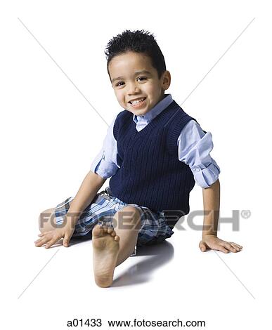 Boy sitting and smiling View Large Photo Image Stock Image - Boy sitting and smiling. Fotosearch