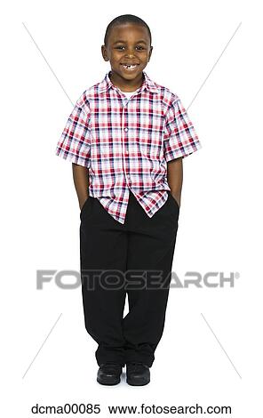 Boy smiling with hands in pockets View Large Photo Image Stock Photography - Boy smiling with hands in pockets. Fotosearch