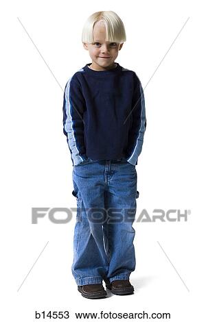 Boy with blonde hair standing with hands in pockets View Large Photo Image Stock Image - Boy with blonde hair standing with hands in pockets. Fotosearch