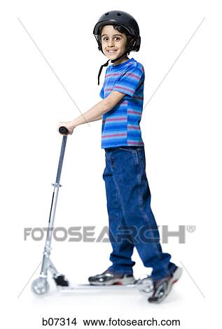 Boy with helmet and scooter View Large Photo Image Picture - Boy with helmet and scooter. Fotosearch
