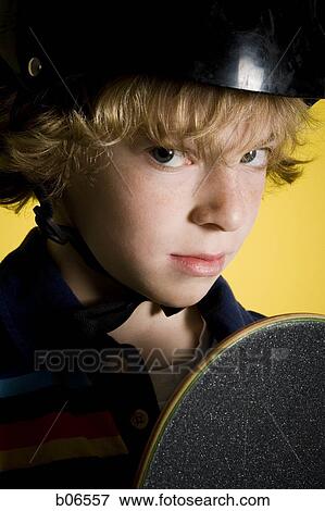 Boy with helmet and shield View Large Photo Image Stock Photo - Boy with helmet and shield. Fotosearch