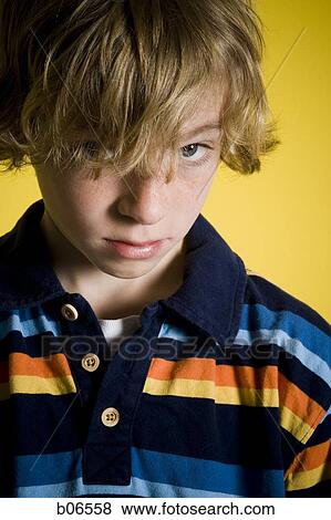 Stock Photo - Boy with long bangs. Fotosearch