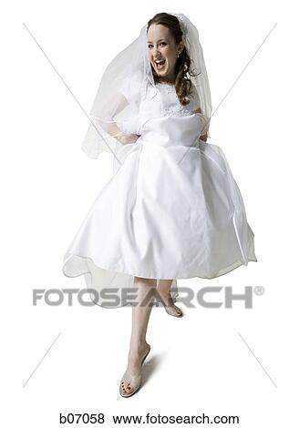 Bride showing off leg View Large Photo Image Stock Photo - Bride showing off leg. Fotosearch