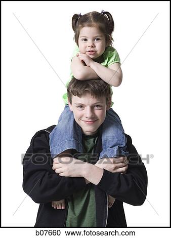 Stock Image - Brother and younger sister. Fotosearch