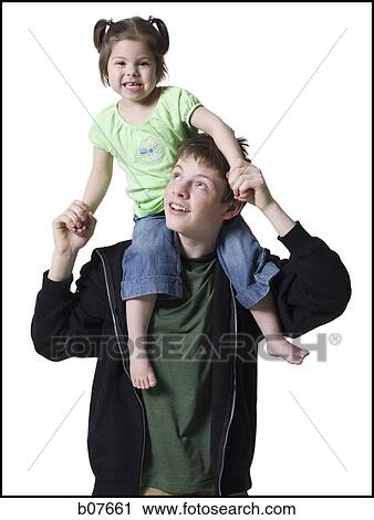 Stock Image - Brother and younger sister. Fotosearch