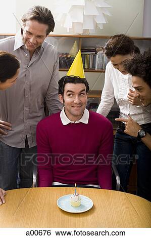 Business people celebrating a birthday View Large Photo Image Stock Photograph - Business people celebrating a birthday. Fotosearch