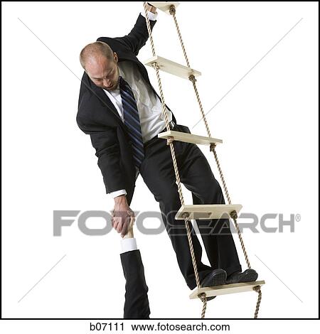 Businessman helping someone up ladder View Large Photo Image Stock Image - Businessman helping someone up ladder. Fotosearch