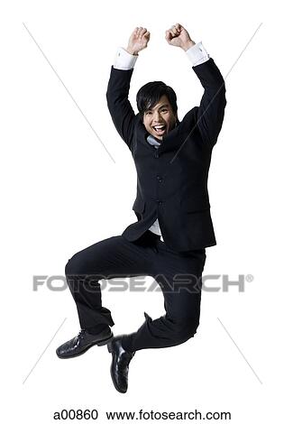 Businessman jumping in the air View Large Photo Image Stock Image - Businessman jumping in the air. Fotosearch