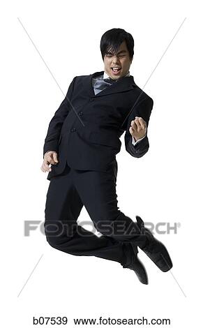 Businessman jumping View Large Photo Image Stock Photo - Businessman jumping. Fotosearch