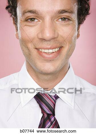 Businessman smiling View Large Photo Image Picture - Businessman smiling. Fotosearch