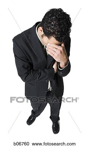 Businessman with hand over face View Large Photo Image Stock Image - Businessman with hand over face. Fotosearch