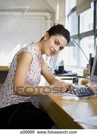 Businesswoman working View Large Photo Image Stock Photo - Businesswoman working. Fotosearch