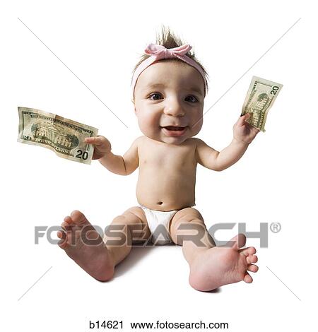 Stock Image - Caricature of baby girl sitting and holding US twenty dollar bills. Fotosearch