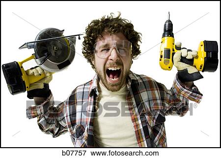 Stock Photo - Carpenter with power tools. Fotosearch