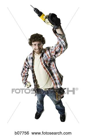 Carpenter with power tools View Large Photo Image Stock Photograph - Carpenter with power tools. Fotosearch