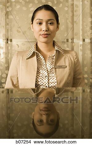 Check in counter attendant View Large Photo Image Picture - Check in counter attendant. Fotosearch