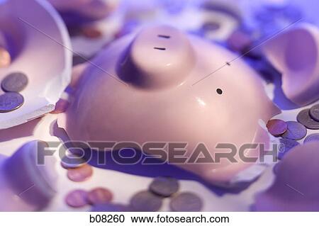 Close-up of a broken piggy bank with coins View Large Photo Image Stock Image - Close-up of a broken piggy bank with coins. Fotosearch