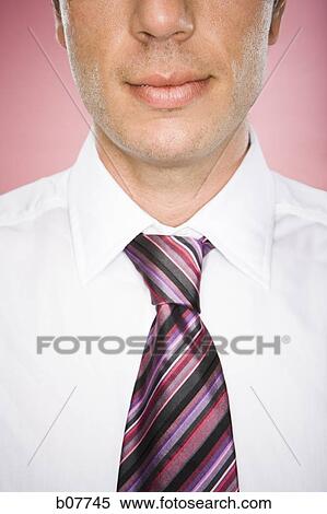 Close-up of a businessman's face from the nose down View Large Photo Image Stock Photography - Close-up of a businessman's face from the nose down. Fotosearch